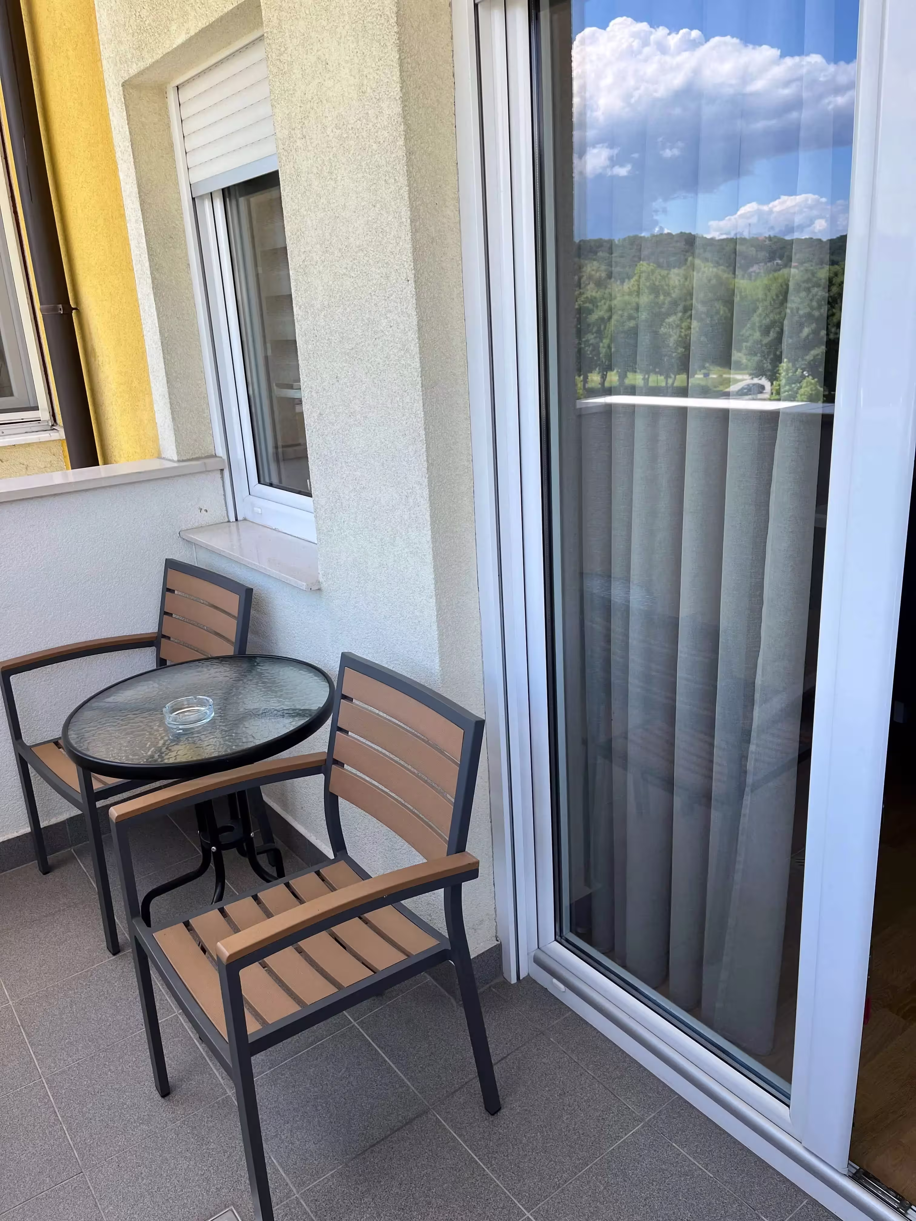 Balcony with scenic view in Dada Apartment 1